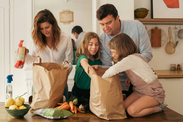 Average Grocery Bill for a Family of 4 in the U.S. (2026 Guide) 2 family of four grocery shopping at home